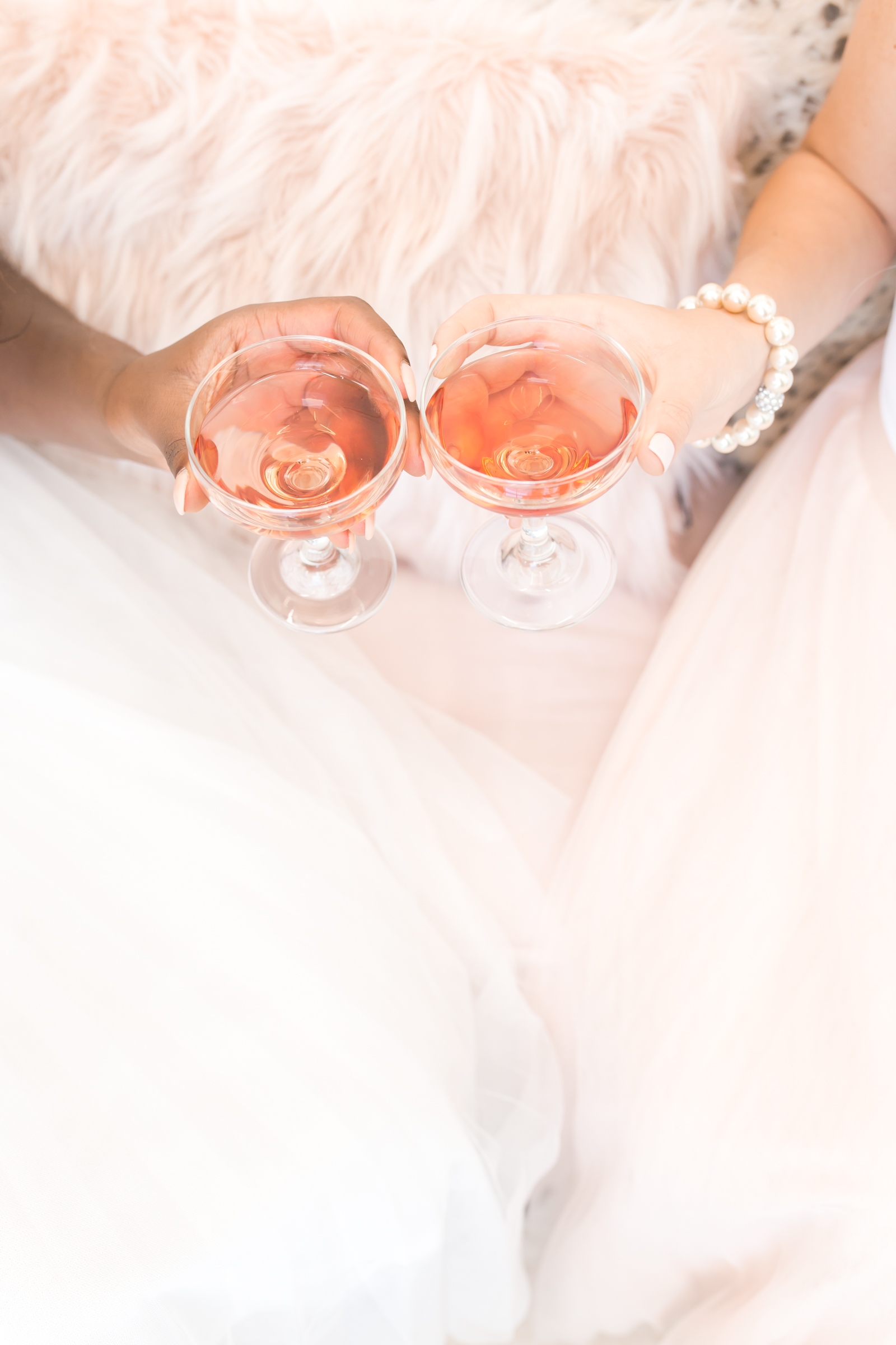 Intimate detail of a connection moment at the Pink Soiree